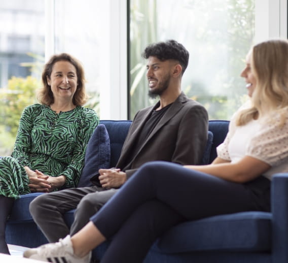  Colleagues sitting on couch