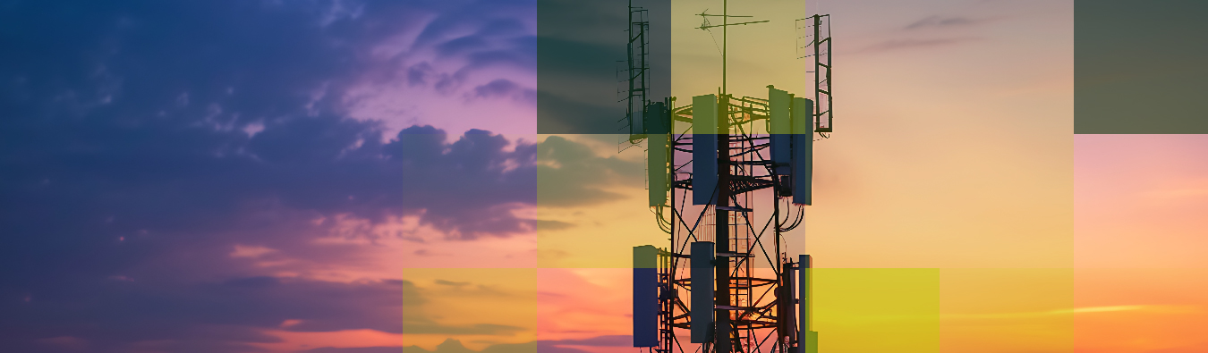 Telecom tower at sunset with city lights in background – representing Hogan Lovells’ landmark legal victory for Vodafone in one of the largest standalone competition cases in the English courts